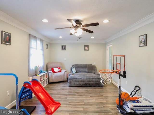 15 Nightingale St, Keyser, WV 26726 - recreation room with a ceiling fan, ornamental molding, wood finished floors, and recessed lighting