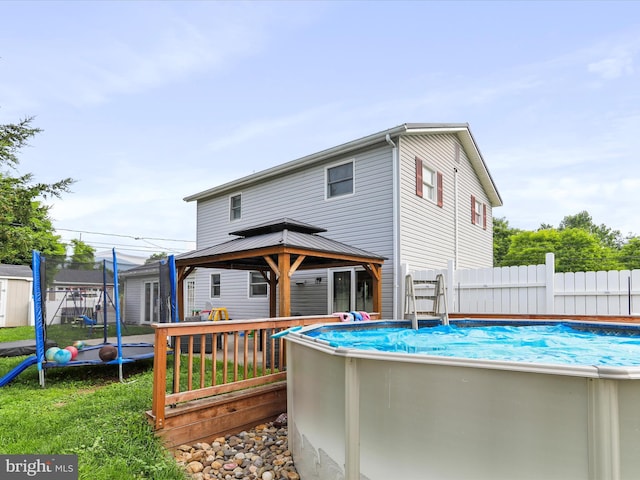 15 Nightingale St, Keyser, WV 26726 - back of house with a gazebo and a playground