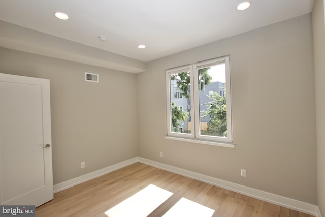 2417 N Hancock St, Philadelphia, PA 19133 - empty room featuring light wood finished floors and recessed lighting