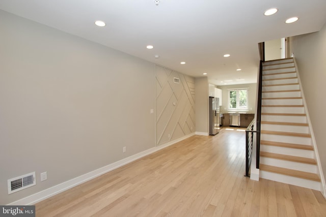 2417 N Hancock St, Philadelphia, PA 19133 - spare room with stairs, light wood-style floors, and recessed lighting