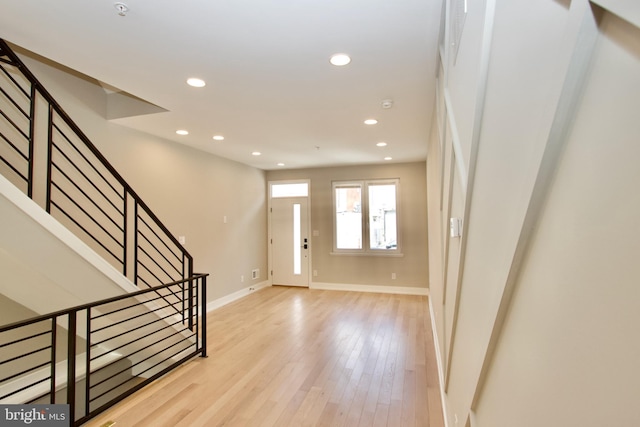 2417 N Hancock St, Philadelphia, PA 19133 - foyer with recessed lighting, light wood-style flooring, and stairs