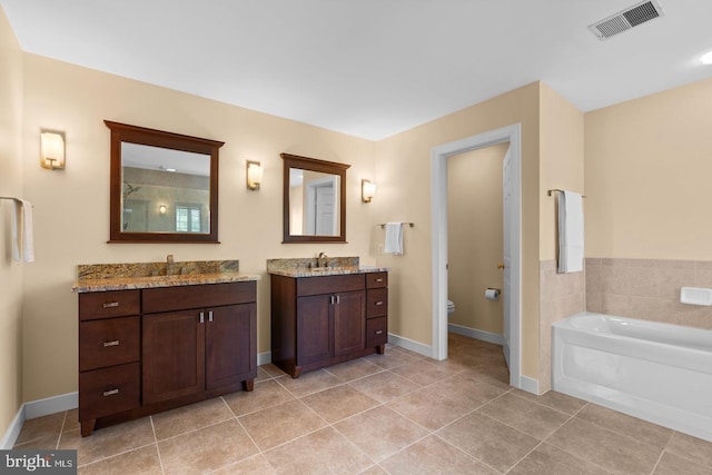 7904 Windsor Knoll Ln, Laytonsville, MD 20882 - full bath featuring a bath, two vanities, tile patterned flooring, and a tile shower