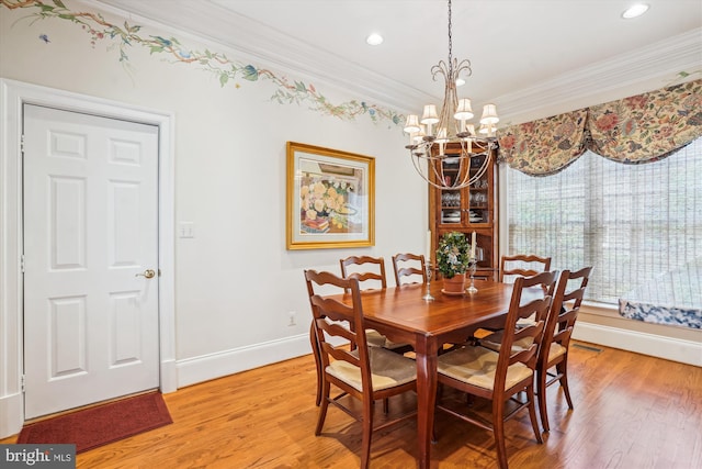 9858 Palace Green Way, Vienna, VA 22181 - dining room featuring crown molding, a chandelier, light wood finished floors, and recessed lighting