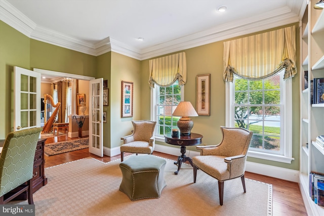 9858 Palace Green Way, Vienna, VA 22181 - sitting room with french doors, wood finished floors, and crown molding