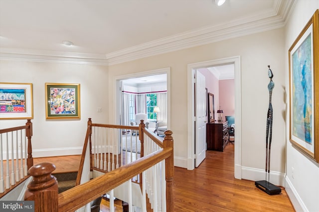 9858 Palace Green Way, Vienna, VA 22181 - hallway with an upstairs landing, ornamental molding, and light wood finished floors
