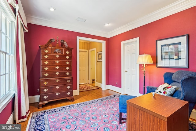9858 Palace Green Way, Vienna, VA 22181 - living area featuring wood finished floors, ornamental molding, and recessed lighting