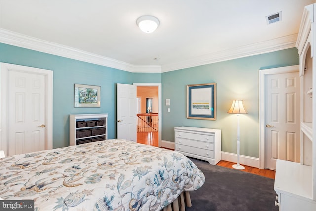 9858 Palace Green Way, Vienna, VA 22181 - bedroom featuring wood finished floors and ornamental molding