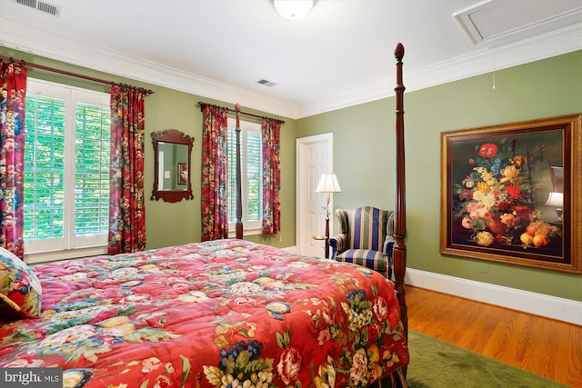 9858 Palace Green Way, Vienna, VA 22181 - bedroom with attic access, multiple windows, wood finished floors, and crown molding