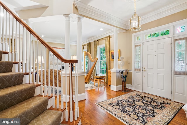 9858 Palace Green Way, Vienna, VA 22181 - entryway featuring decorative columns, ornamental molding, stairway, plenty of natural light, and recessed lighting