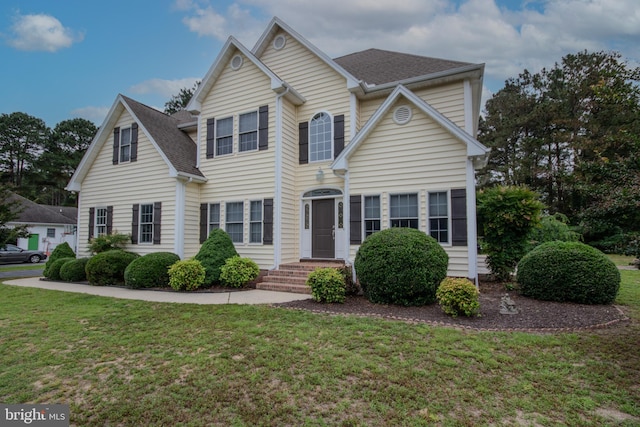 26294 Evesboro Ln, Eden, MD 21822 - traditional home with a front lawn and roof with shingles