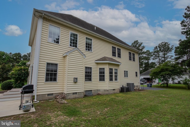 26294 Evesboro Ln, Eden, MD 21822 - back of property with crawl space and a lawn