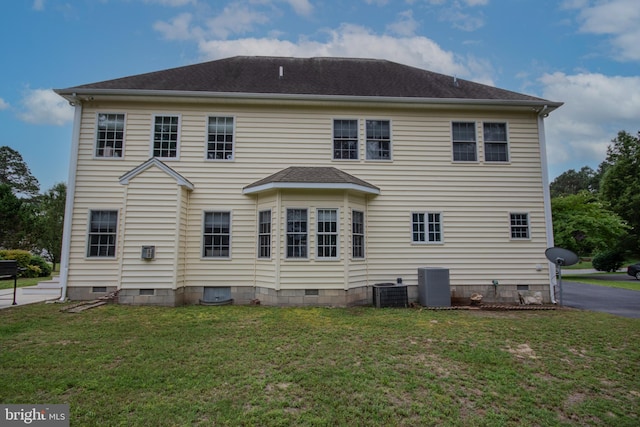 26294 Evesboro Ln, Eden, MD 21822 - back of property featuring crawl space, a lawn, and a shingled roof