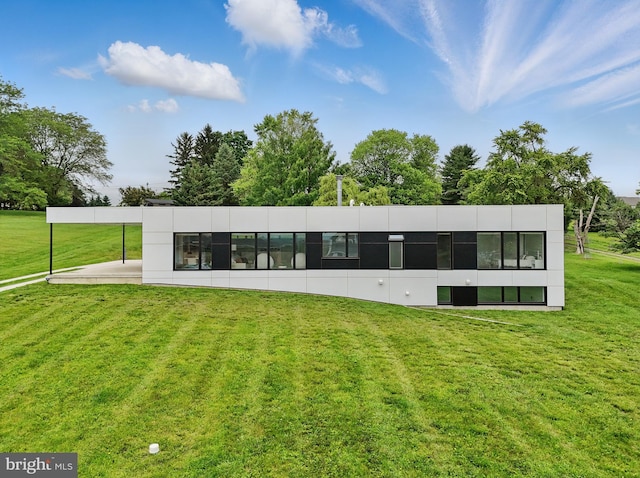 317 Clearview Ave, Nazareth, PA 18064 - back of property featuring a lawn and a sunroom