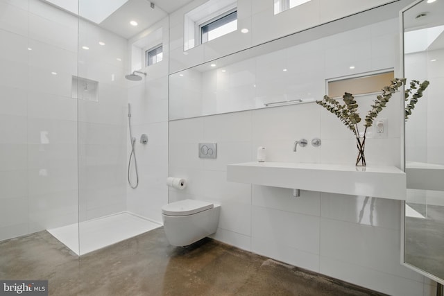317 Clearview Ave, Nazareth, PA 18064 - full bath with a walk in shower, tile walls, and concrete floors