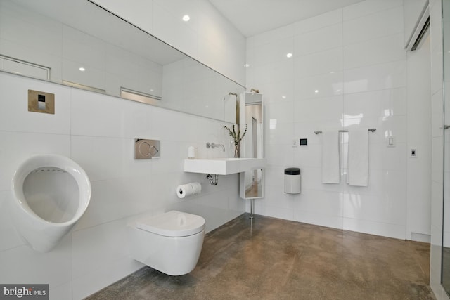 317 Clearview Ave, Nazareth, PA 18064 - bathroom featuring concrete flooring and tile walls