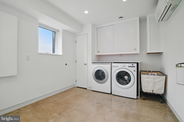 317 Clearview Ave, Nazareth, PA 18064 - laundry area featuring an AC wall unit, washer and dryer, cabinet space, and recessed lighting