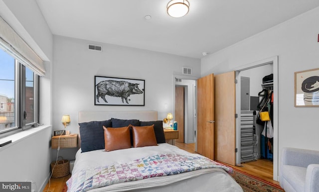 1800 S 16th St Unit B, Philadelphia, PA 19145 - bedroom with wood finished floors, a closet, and a spacious closet
