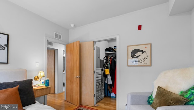 1800 S 16th St Unit B, Philadelphia, PA 19145 - bedroom featuring light wood finished floors, a spacious closet, and a closet