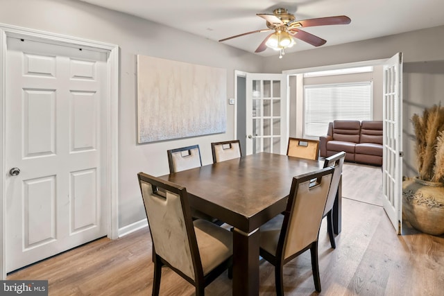 94 E Oak Ave, Lawnside, NJ 08045 - dining space featuring light wood-style flooring, a ceiling fan, and french doors