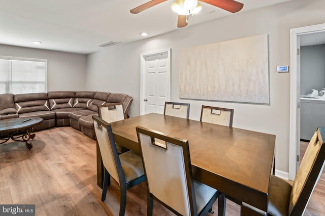94 E Oak Ave, Lawnside, NJ 08045 - dining room with wood finished floors, washing machine and clothes dryer, a ceiling fan, and recessed lighting