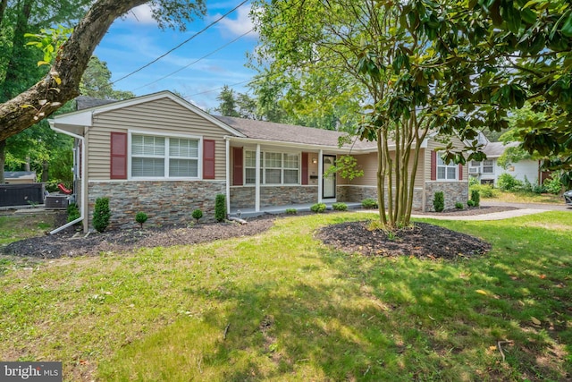 94 E Oak Ave, Lawnside, NJ 08045 - ranch-style house with stone siding, a front yard, and a porch