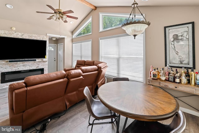 94 E Oak Ave, Lawnside, NJ 08045 - dining area featuring wood finished floors, ceiling fan, and a stone fireplace