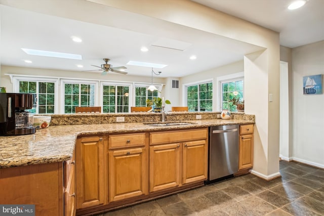 3010 Phyllmar Pl, Oakton, VA 22124 - kitchen featuring dishwasher, a skylight, light stone countertops, a ceiling fan, and recessed lighting