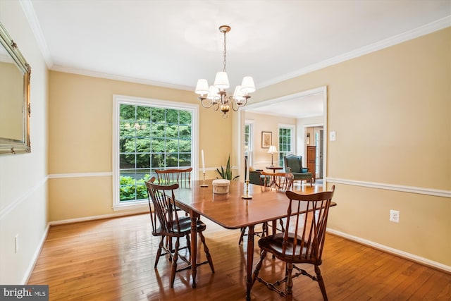3010 Phyllmar Pl, Oakton, VA 22124 - dining room with light wood finished floors, a chandelier, and crown molding