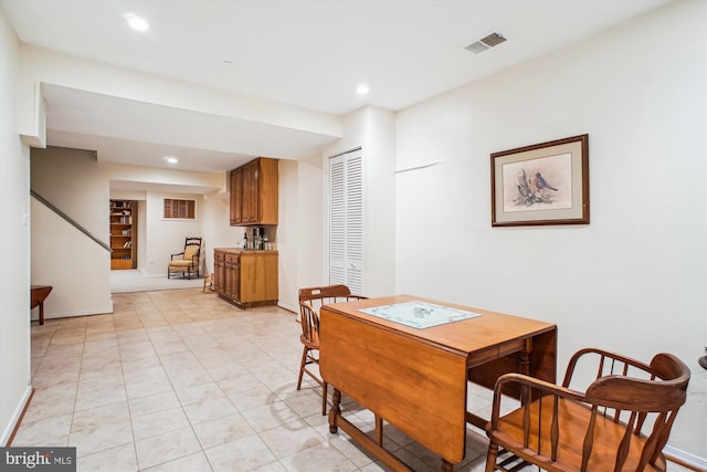 3010 Phyllmar Pl, Oakton, VA 22124 - dining space with stairs, recessed lighting, and bar area