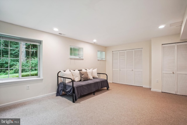 3010 Phyllmar Pl, Oakton, VA 22124 - carpeted bedroom featuring two closets and recessed lighting