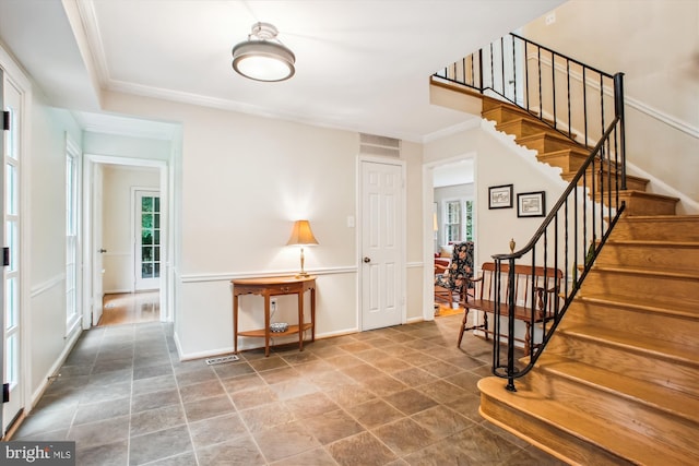 3010 Phyllmar Pl, Oakton, VA 22124 - foyer featuring healthy amount of natural light, stairway, and ornamental molding