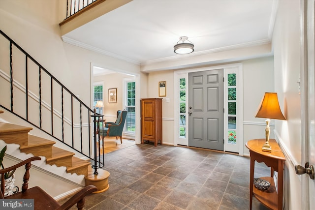 3010 Phyllmar Pl, Oakton, VA 22124 - foyer featuring ornamental molding, stairs, and stone finish flooring