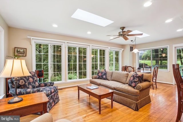3010 Phyllmar Pl, Oakton, VA 22124 - living area with a skylight, light wood finished floors, recessed lighting, and a ceiling fan