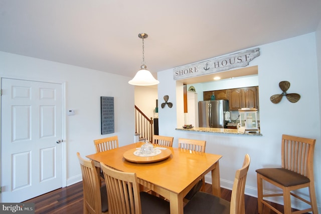 101 Main St Unit 115, Secretary, MD 21664 - dining space featuring dark wood-style floors