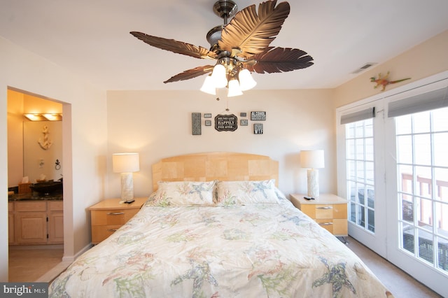 101 Main St Unit 115, Secretary, MD 21664 - bedroom with ensuite bathroom, access to outside, and a ceiling fan