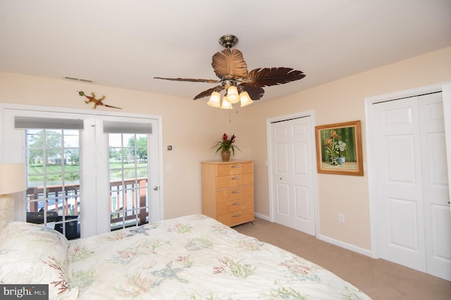 101 Main St Unit 115, Secretary, MD 21664 - bedroom featuring access to exterior, carpet floors, multiple closets, and a ceiling fan