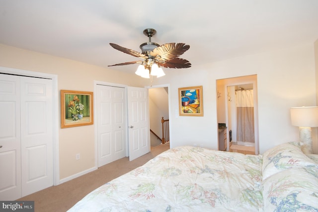101 Main St Unit 115, Secretary, MD 21664 - bedroom with two closets, light colored carpet, and ceiling fan