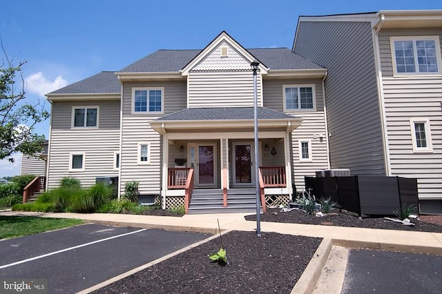 101 Main St Unit 115, Secretary, MD 21664 - multi unit property featuring covered porch and uncovered parking