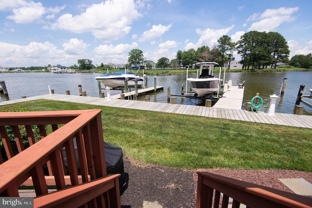 101 Main St Unit 115, Secretary, MD 21664 - dock area with boat lift, a yard, and a water view