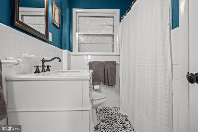 1120 Stokes, Haddon Township, NJ 08108 - full bath featuring tile walls, vanity, tile patterned floors, a shower with shower curtain, and wainscoting