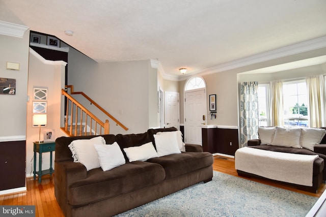3166 Freestone Ct, Abingdon, MD 21009 - living room featuring wood finished floors, stairway, and crown molding