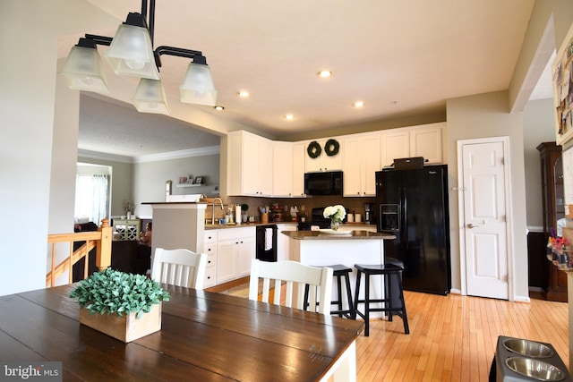 3166 Freestone Ct, Abingdon, MD 21009 - dining area featuring light wood-style floors, ornamental molding, and recessed lighting