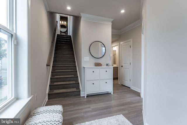 7282 Nittany Ln, Alexandria, VA 22306 - stairs with crown molding, wood finished floors, and recessed lighting