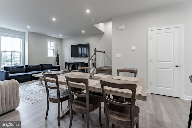 7282 Nittany Ln, Alexandria, VA 22306 - dining space featuring light wood-type flooring, recessed lighting, and stairway