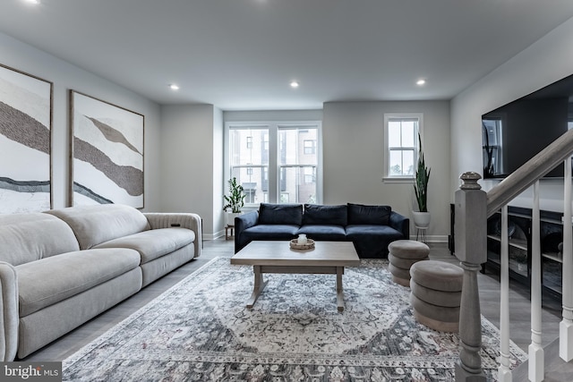 7282 Nittany Ln, Alexandria, VA 22306 - living room with recessed lighting, wood finished floors, and stairs