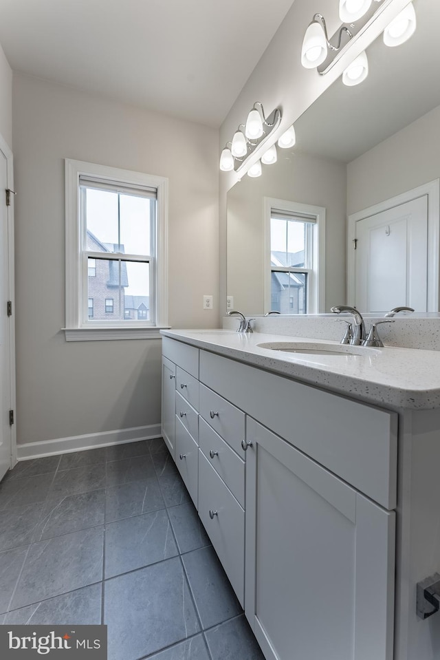 7282 Nittany Ln, Alexandria, VA 22306 - bathroom featuring double vanity and baseboards