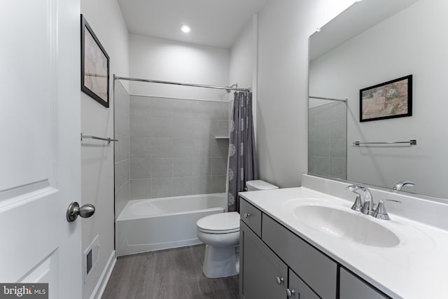 7282 Nittany Ln, Alexandria, VA 22306 - bathroom with wood finished floors, vanity, and shower / bath combo with shower curtain