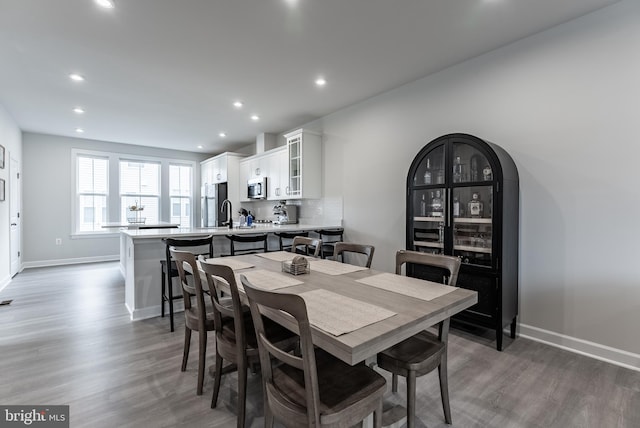 7282 Nittany Ln, Alexandria, VA 22306 - dining area featuring wood finished floors and recessed lighting