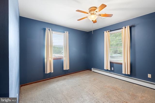 136 Main St, Red Hill, PA 18076 - carpeted empty room featuring a baseboard radiator, healthy amount of natural light, and ceiling fan