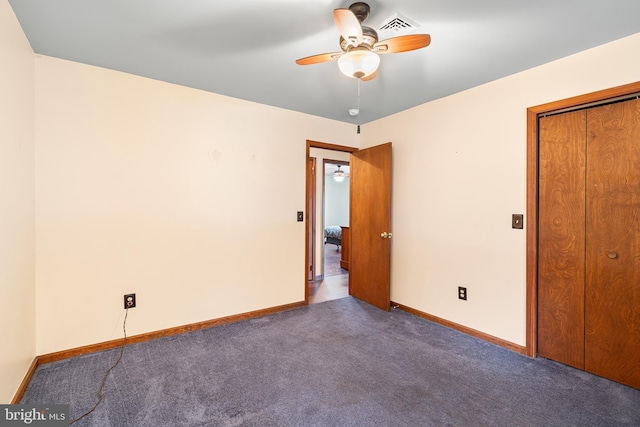 136 Main St, Red Hill, PA 18076 - spare room with ceiling fan and dark carpet
